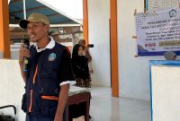 Kepala Desa Madopolo Ahmad Ibrahim Ode Besi Saat Memberikan Sambutan (Foto/Ipul)