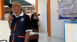 Kepala Desa Madopolo Ahmad Ibrahim Ode Besi Saat Memberikan Sambutan (Foto/Ipul)